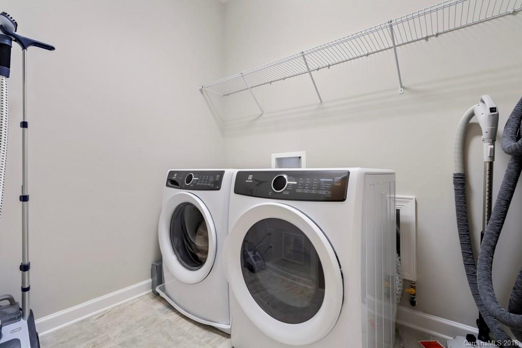 5354 Meadowcroft Way, Unit 56 Fort Mill, SC 29708 - Photo 23 of 36 a utility room with dryer and washer