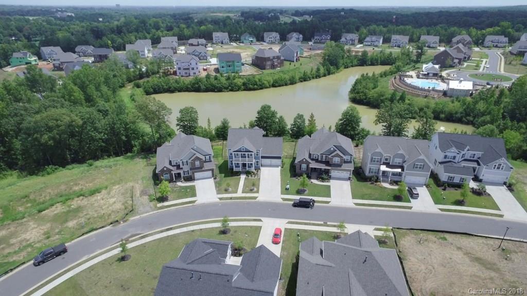 5354 Meadowcroft Way, Unit 56 Fort Mill, SC 29708 - Photo 34 of 36 an aerial view of residential houses with outdoor space and river