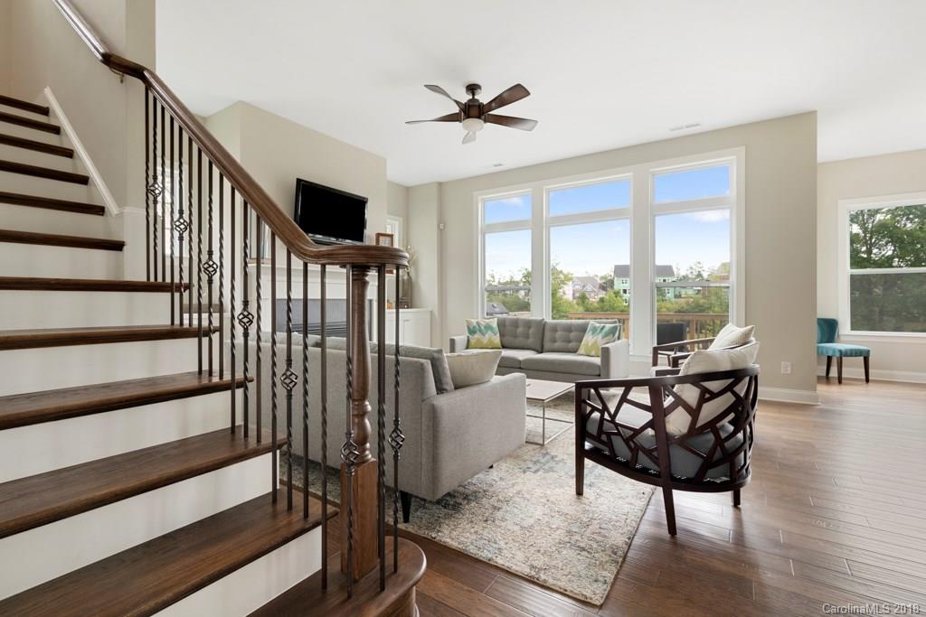 5354 Meadowcroft Way, Unit 56 Fort Mill, SC 29708 - Photo 5 of 36 a living room with furniture and a large window