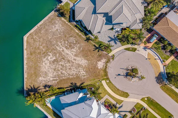 an aerial view of a highlighted house