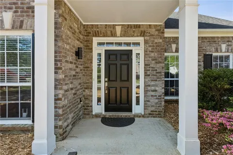 a front view of a house with a door