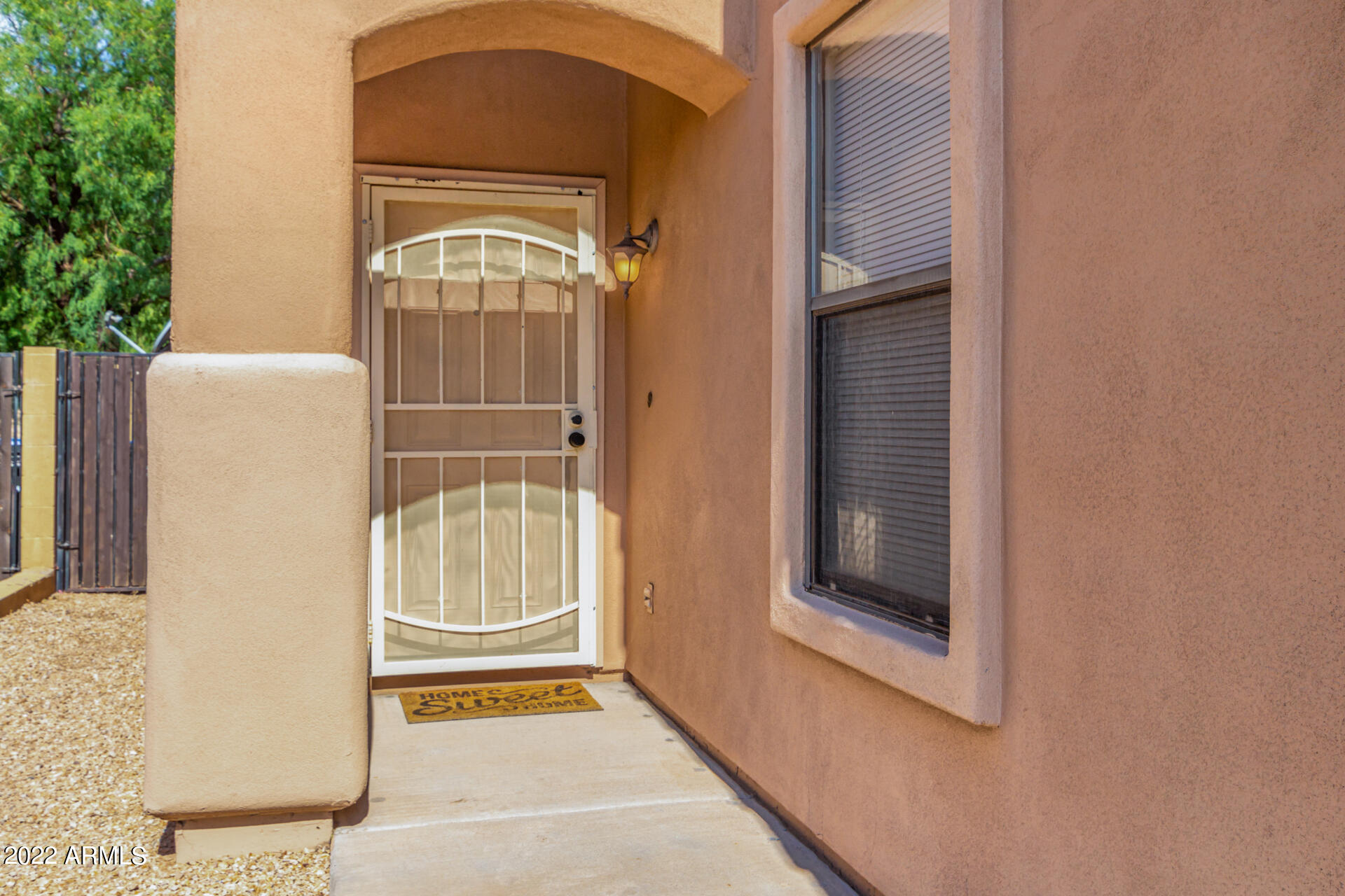 2565 South Signal Butte Road, Unit 47 Mesa, AZ 85209 - Photo 3 of 29 a front view of a house with a door