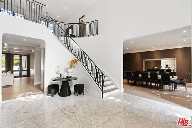 a view of livingroom with furniture and staircase