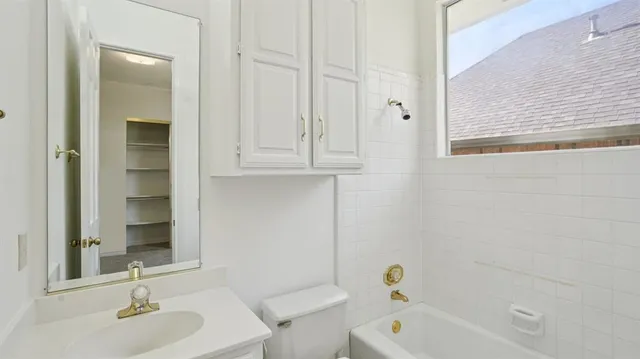 a bathroom with a sink and a bathtub