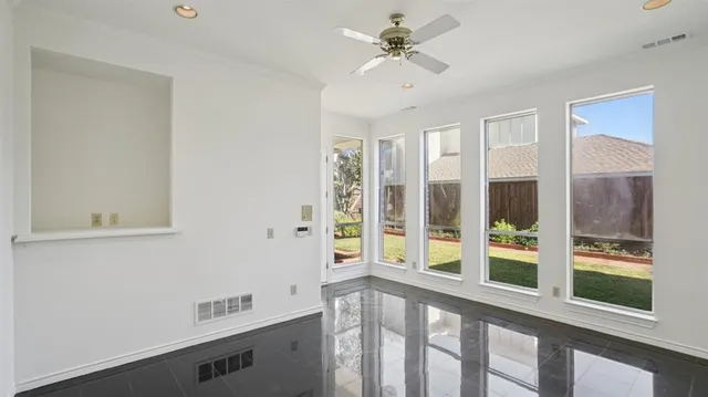 a view of a room with a large window