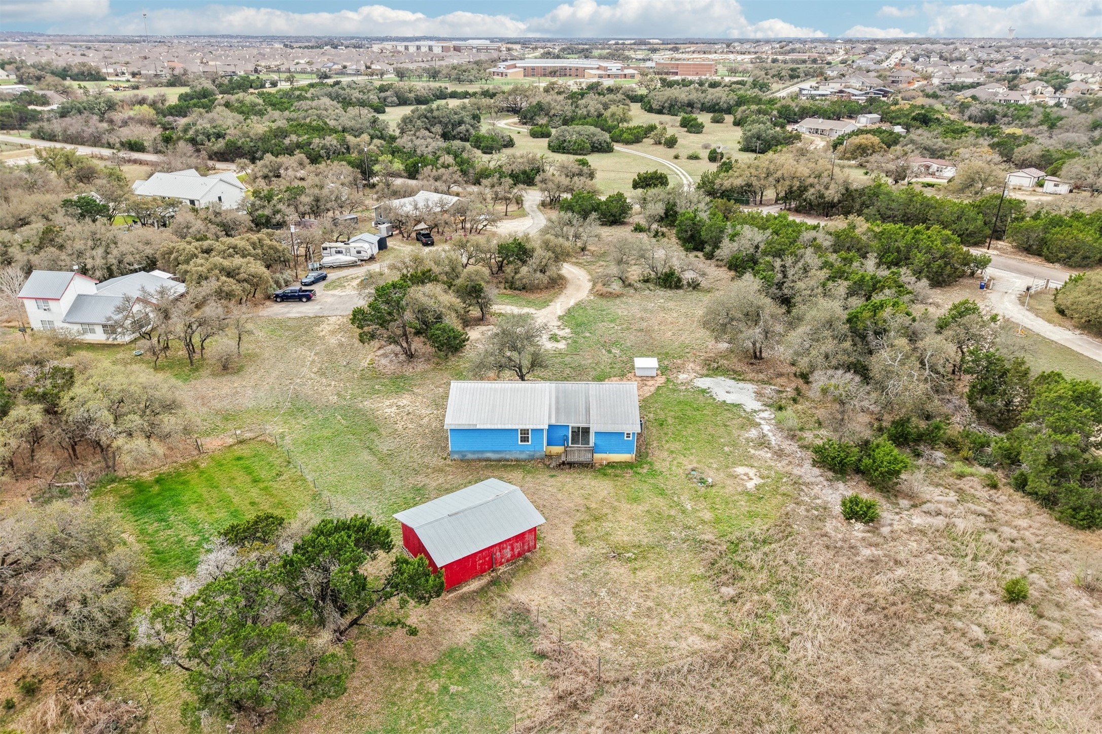 1470 Oak Grove Road Leander, TX 78641 - Photo 34 of 38 an aerial view of a house with a yard