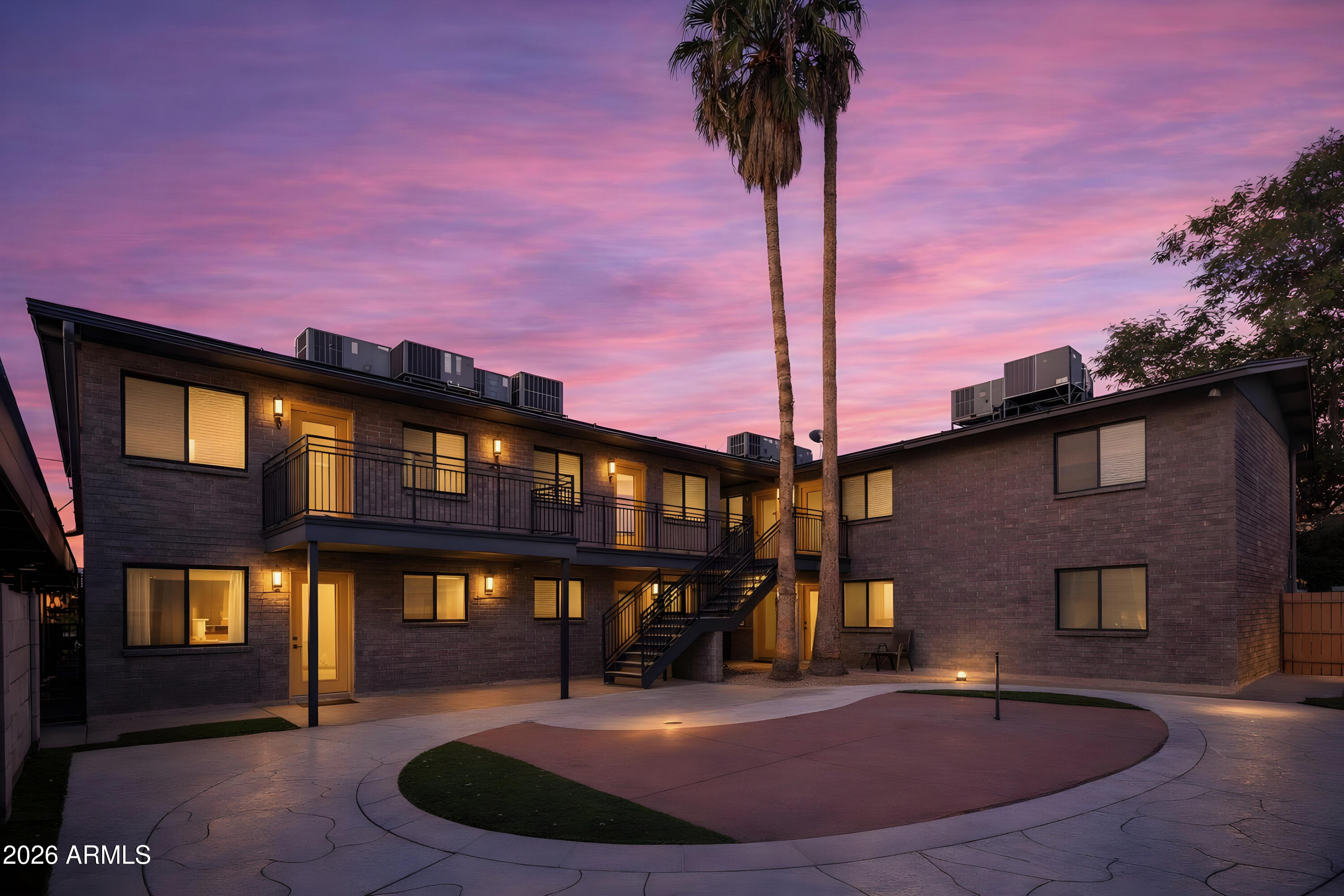 a front view of a house with yard