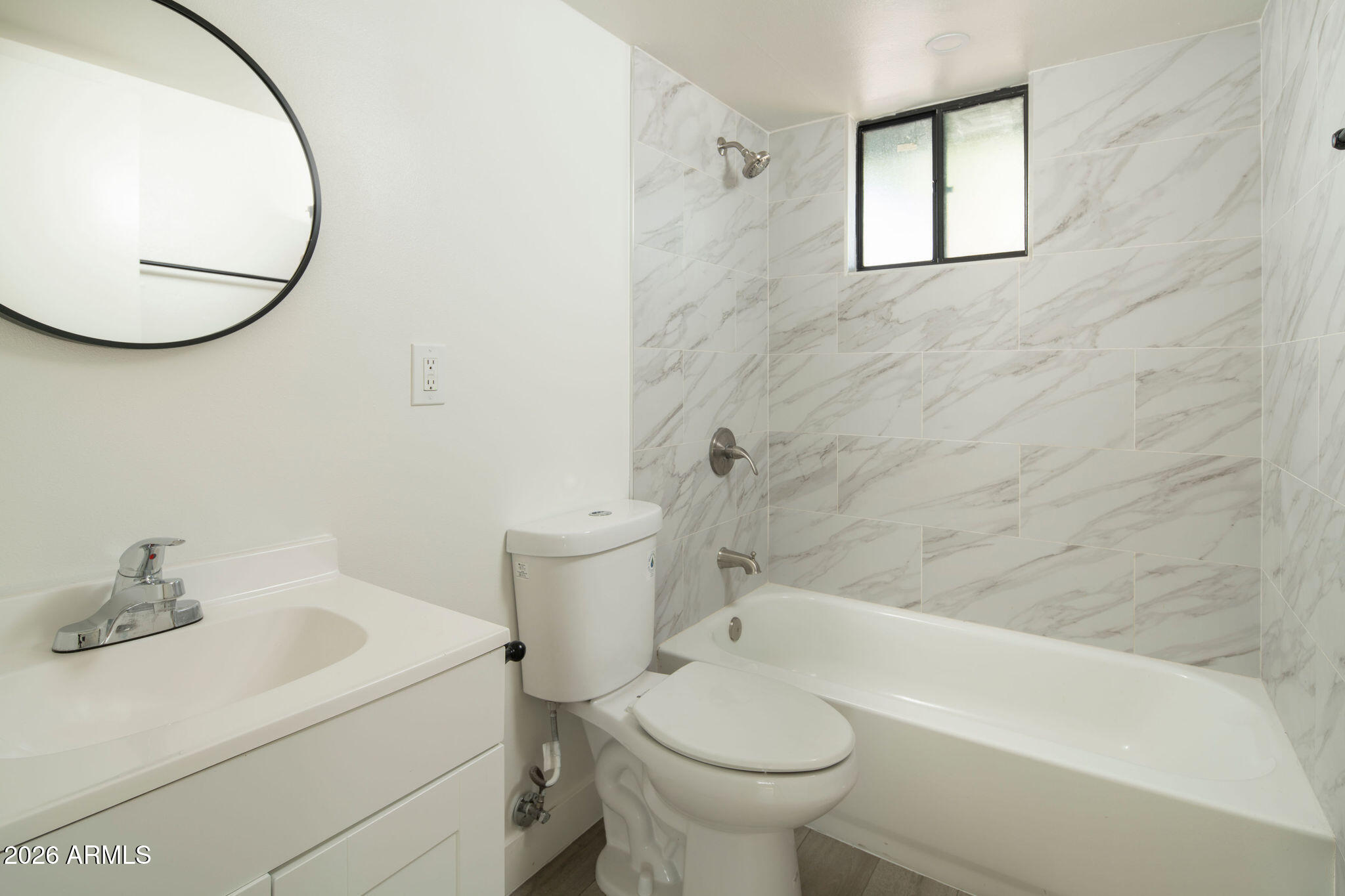 4119 North 11th Avenue Phoenix, AZ 85013 - Photo 18 of 28 a bathroom with a sink toilet and a bathtub