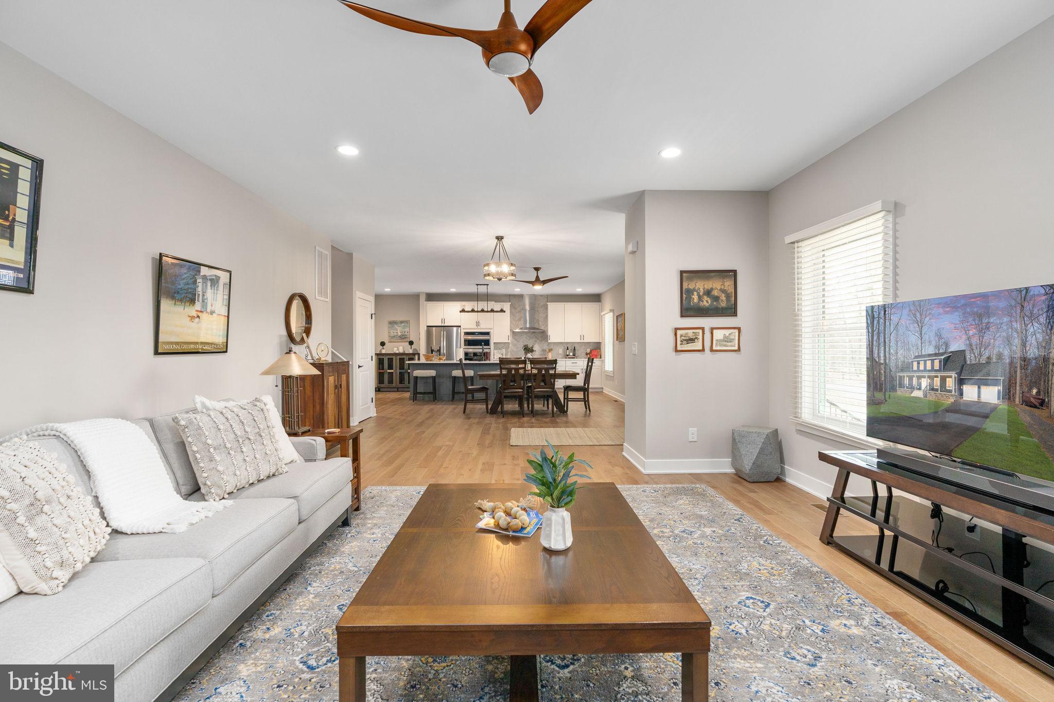 261 Washington Street Locust Grove, VA 22508 - Photo 13 of 69 a living room with furniture and a flat screen tv