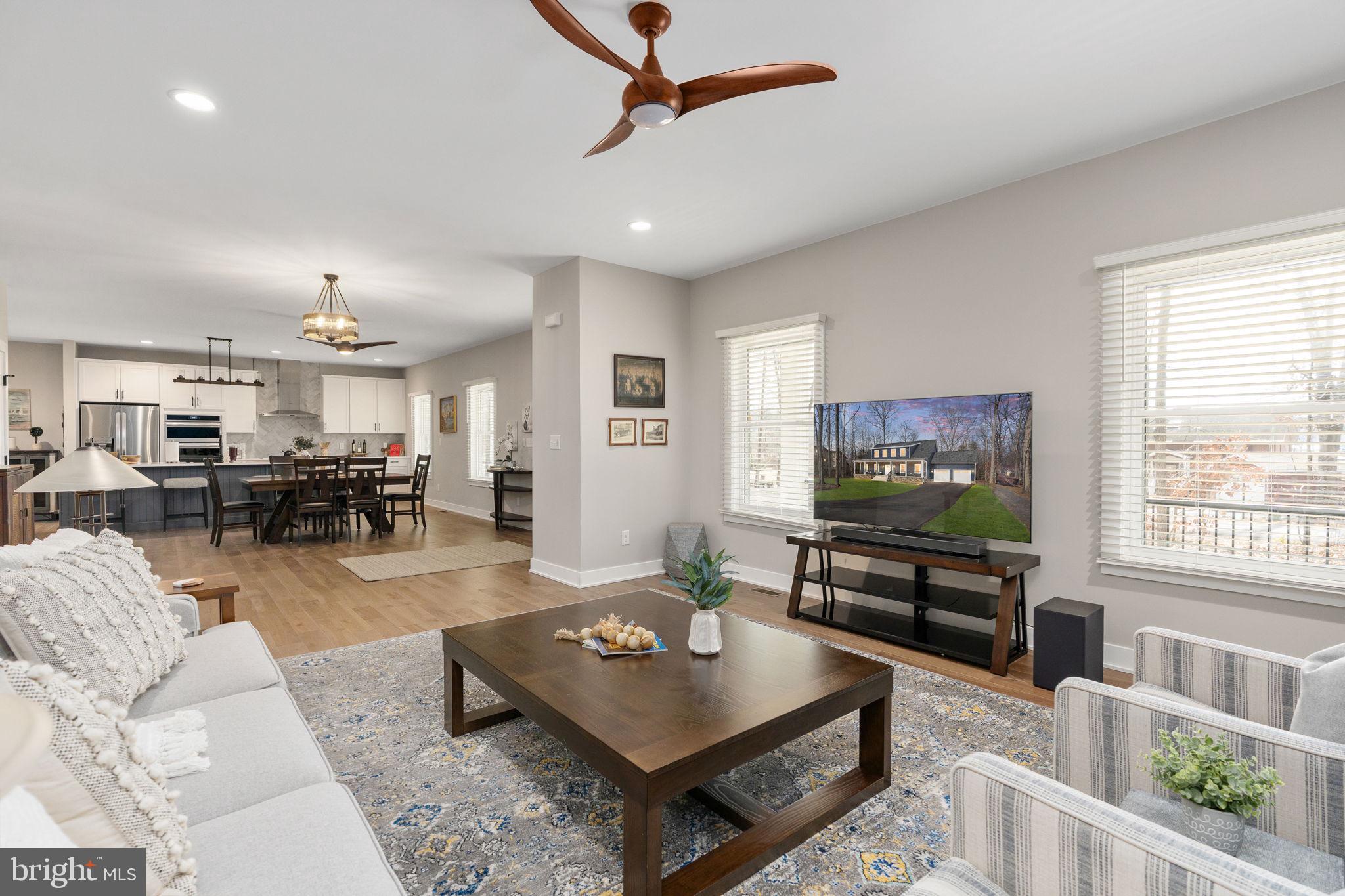 261 Washington Street Locust Grove, VA 22508 - Photo 14 of 69 a living room with furniture and a flat screen tv