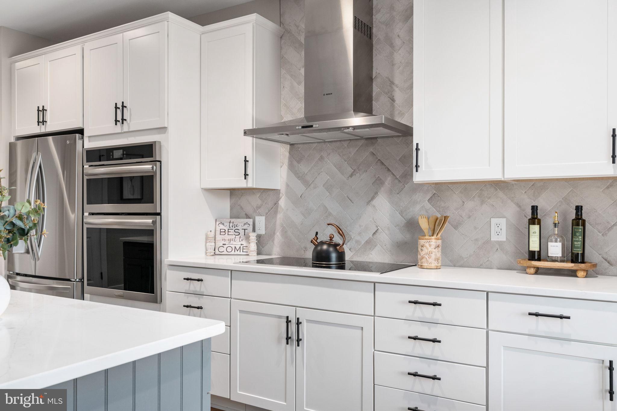 261 Washington Street Locust Grove, VA 22508 - Photo 16 of 69 a kitchen with appliances a sink and cabinets