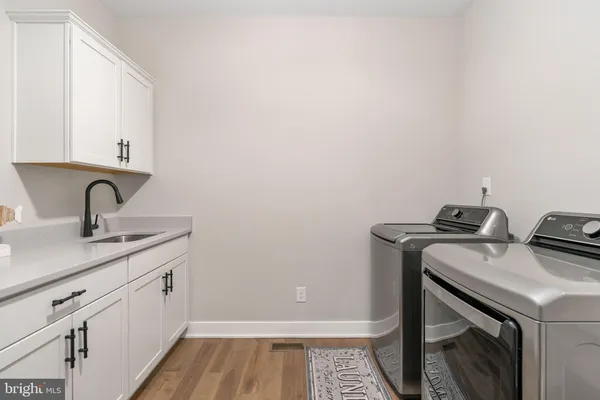 an aerial view of a houses with ocean view