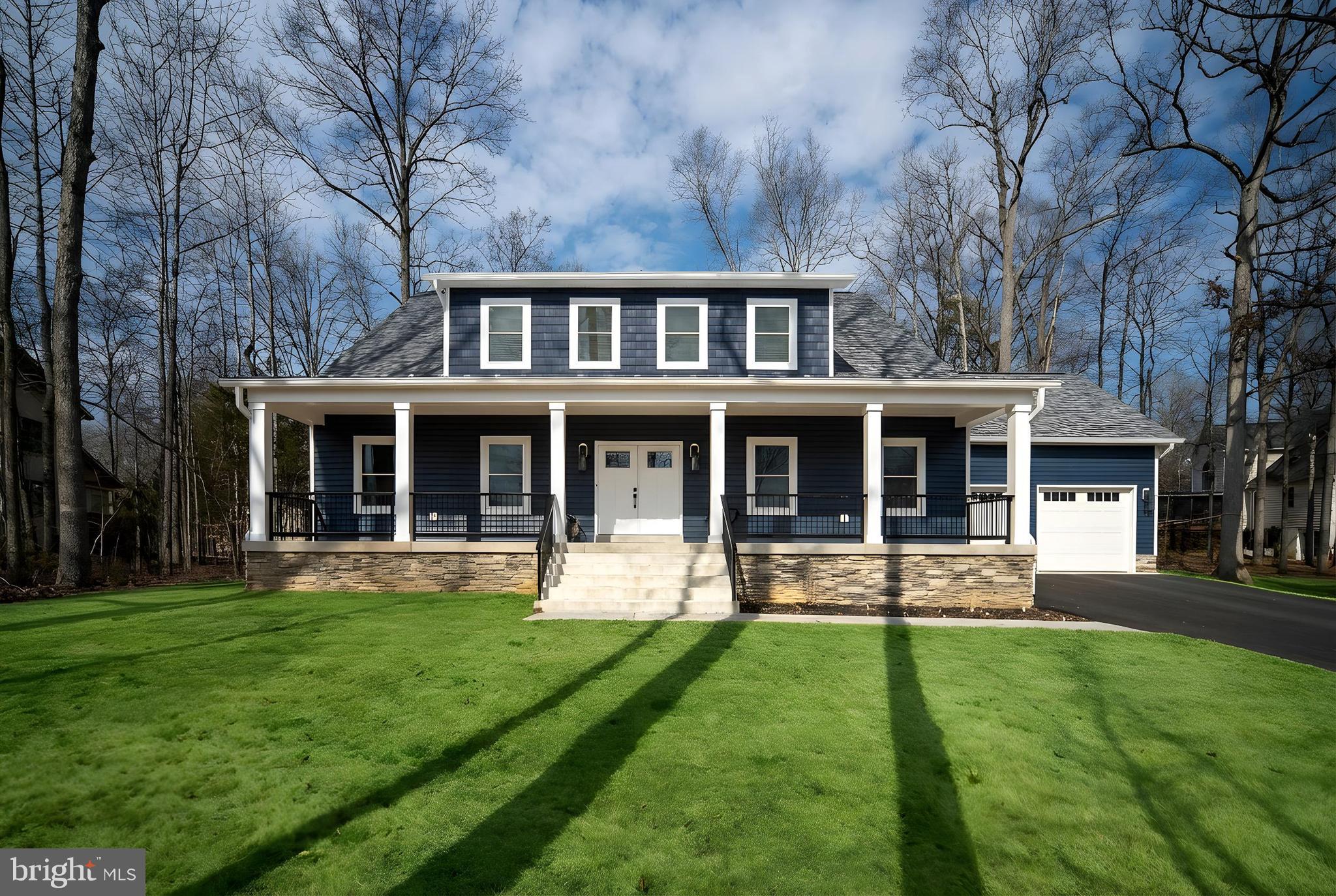 261 Washington Street Locust Grove, VA 22508 - Photo 4 of 69 a front view of a house with a yard