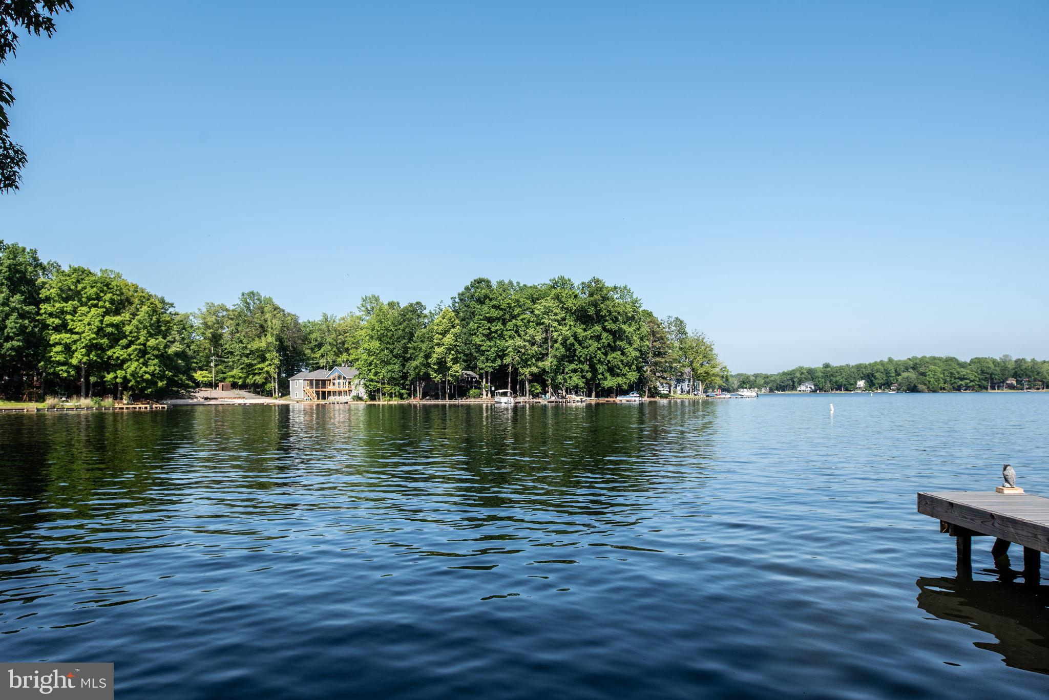 261 Washington Street Locust Grove, VA 22508 - Photo 62 of 90 a view of a lake with houses