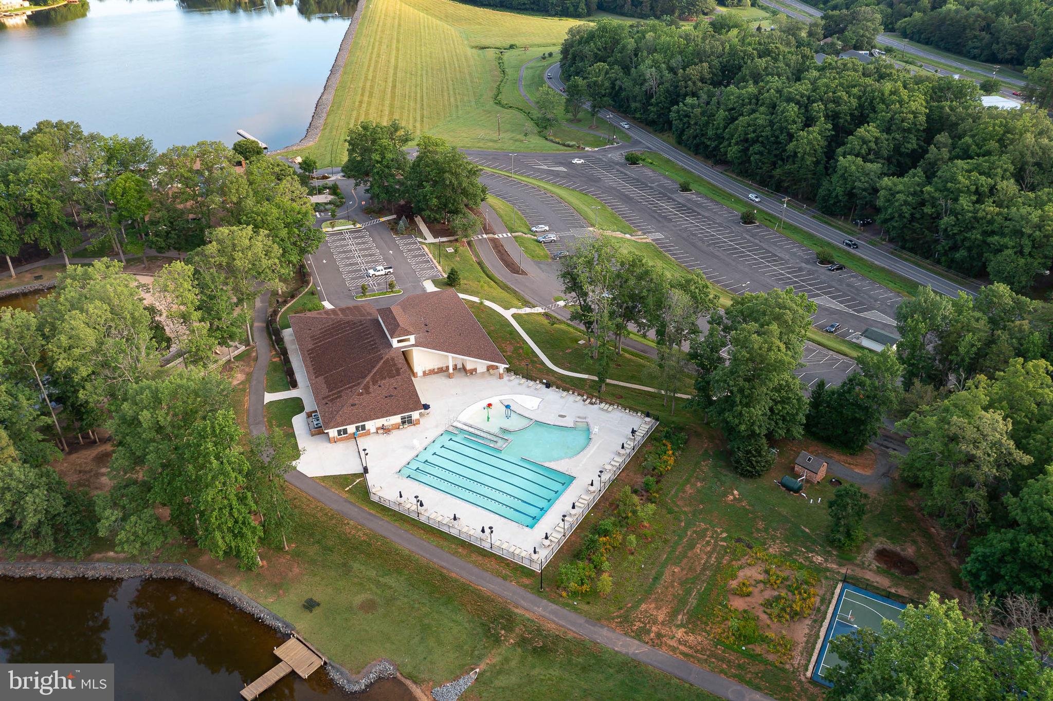 261 Washington Street Locust Grove, VA 22508 - Photo 65 of 90 an aerial view of a residential houses with outdoor space and swimming pool