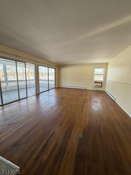 113 D North Shore Point Montague, NJ 07827 - Photo 1 of 18 wooden floor in an empty room with a window