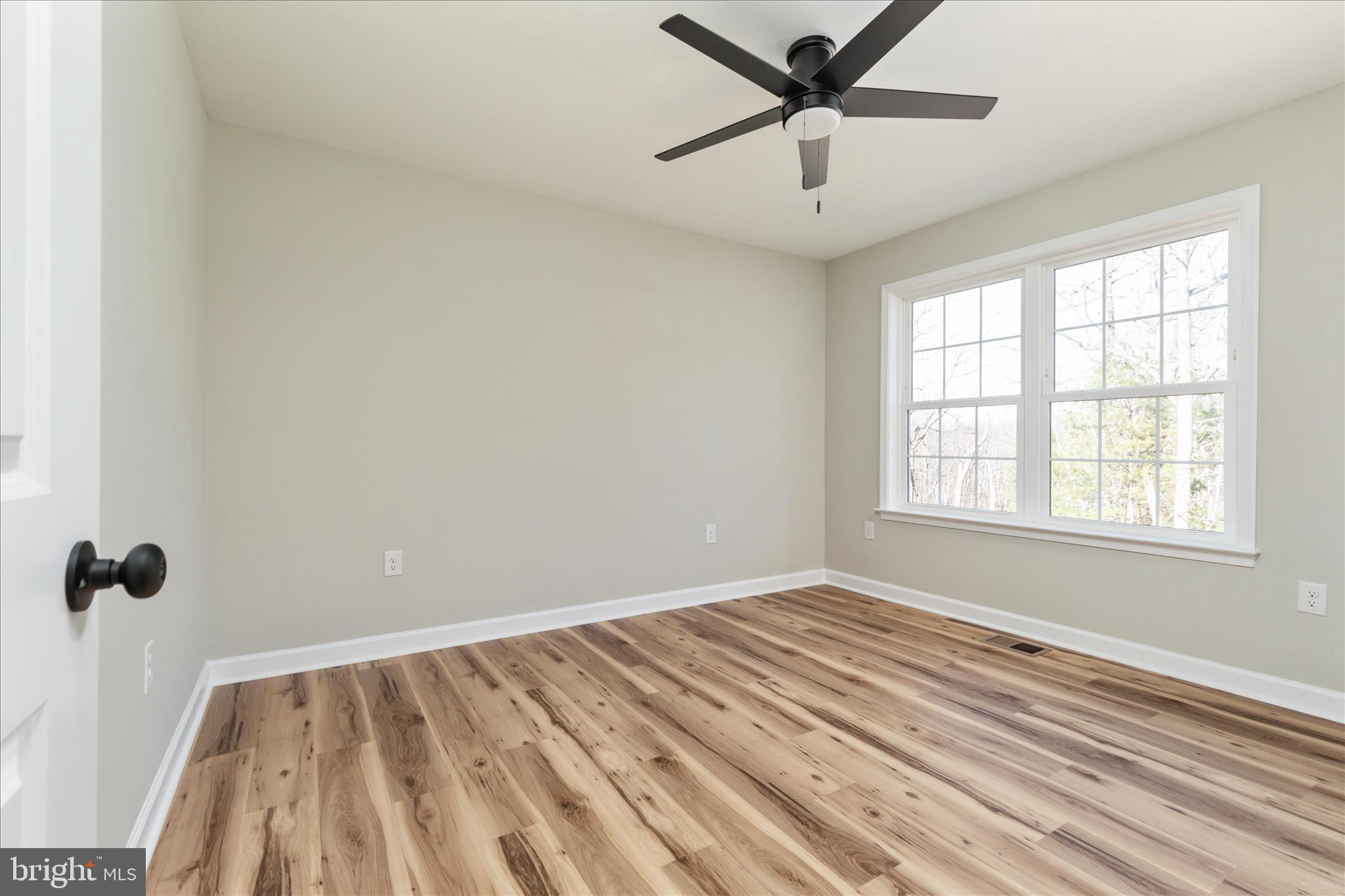 Howellsville Road Front Royal, VA 22630 - Photo 18 of 44 a view of a room with a window and a ceiling fan