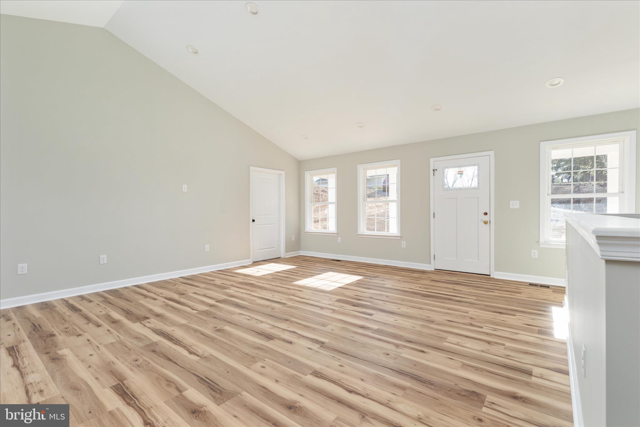 Howellsville Road Front Royal, VA 22630 - Photo 6 of 44 a view of empty room with wooden floor and fan