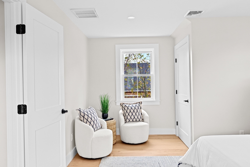 19 Ford Place, Unit 1 Scituate, MA 02066 - Photo 23 of 35 a living room with furniture and a window