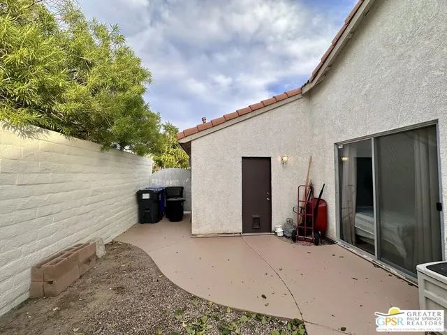a view of a terrace with seating space