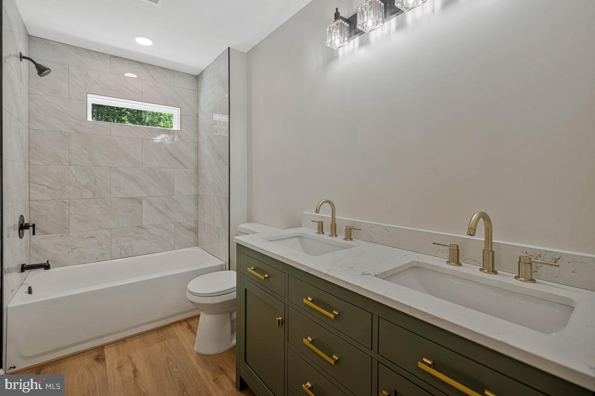 13304 Cherry Tree Crossing Road Brandywine, MD 20613 - Photo 19 of 32 Elegant dual-sink bathroom retreat.