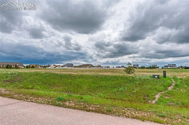 a view of a lake with a big yard