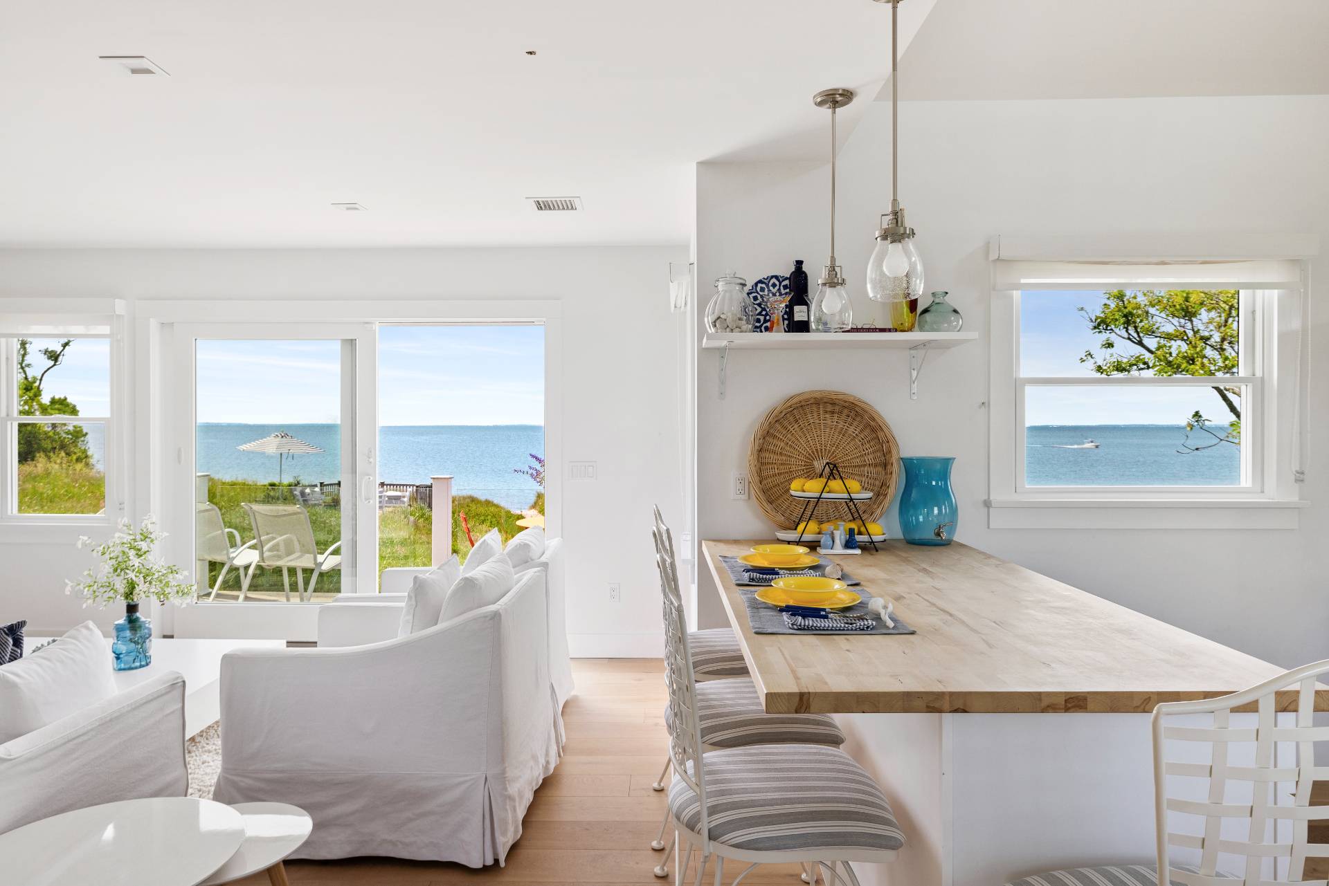 48 Bay Inlet Road East Hampton, NY 11937 - Photo 14 of 46 a living room with furniture and a floor to ceiling window