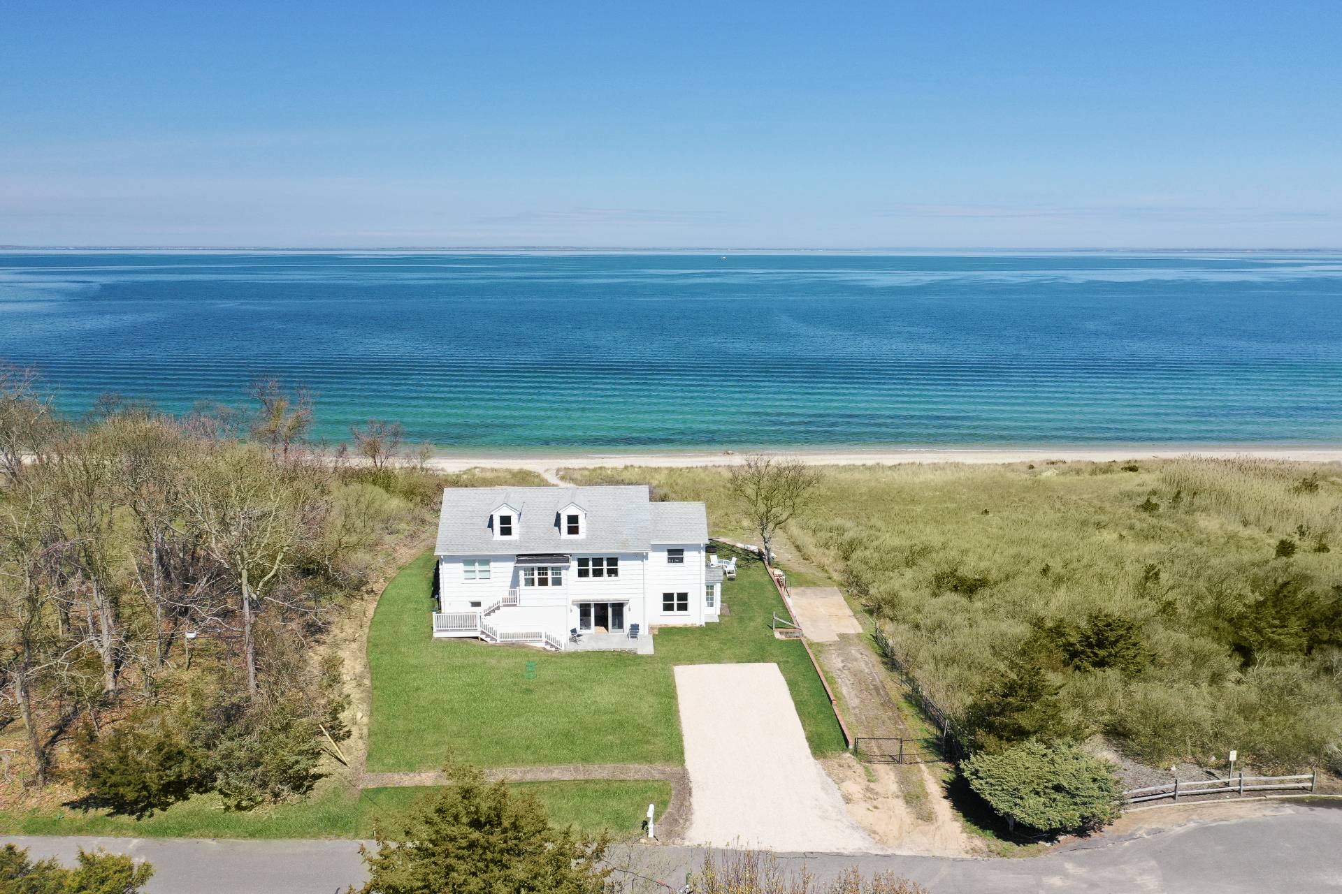 48 Bay Inlet Road East Hampton, NY 11937 - Photo 2 of 46 a view of a room with racks on the wall