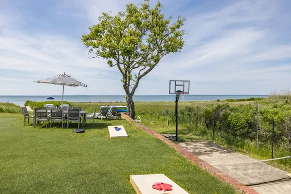 a view of a bench in front of house