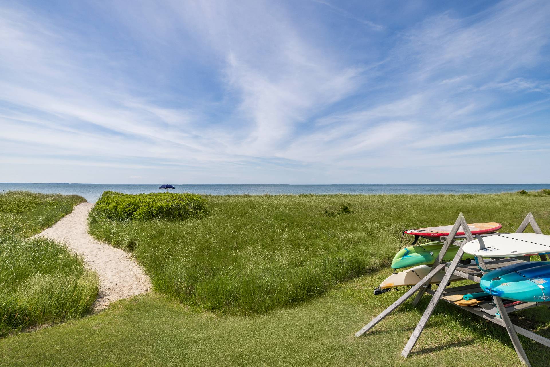 48 Bay Inlet Road East Hampton, NY 11937 - Photo 38 of 46 a view of a swimming pool with an outdoor seating