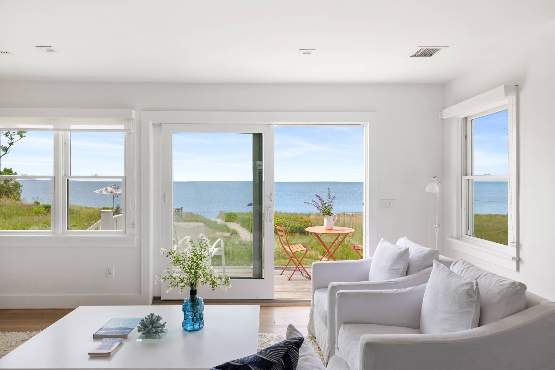 48 Bay Inlet Road East Hampton, NY 11937 - Photo 6 of 46 a living room with furniture and a potted plant