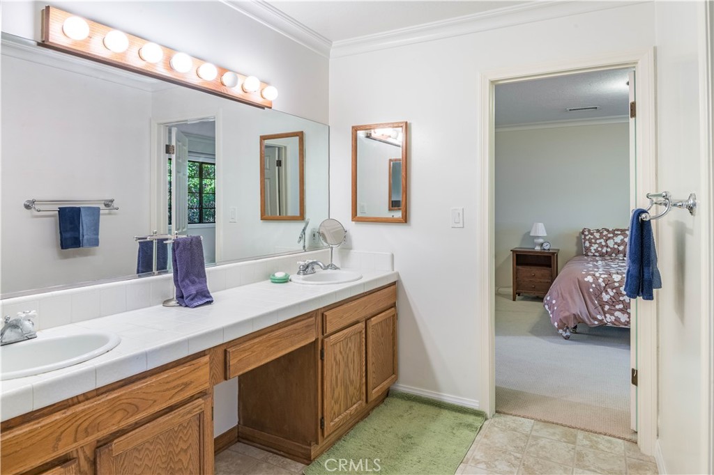 63 Ranchview Road Rolling Hills Estates, CA 90274 - Photo 13 of 28 a bathroom with a sink double vanity and a mirror