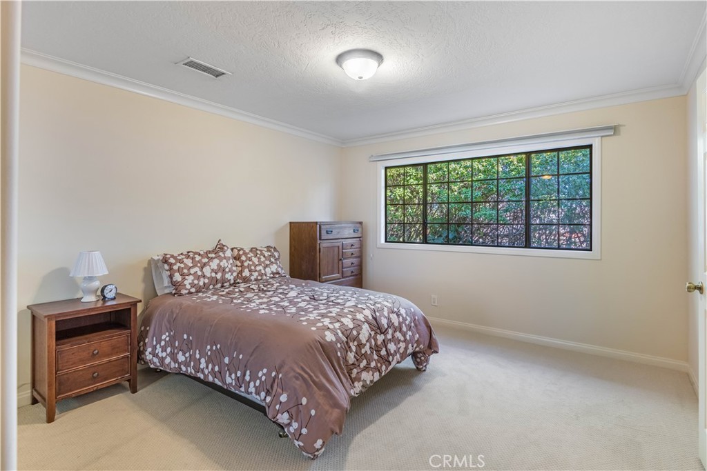 63 Ranchview Road Rolling Hills Estates, CA 90274 - Photo 14 of 28 a bedroom with a bed and a window