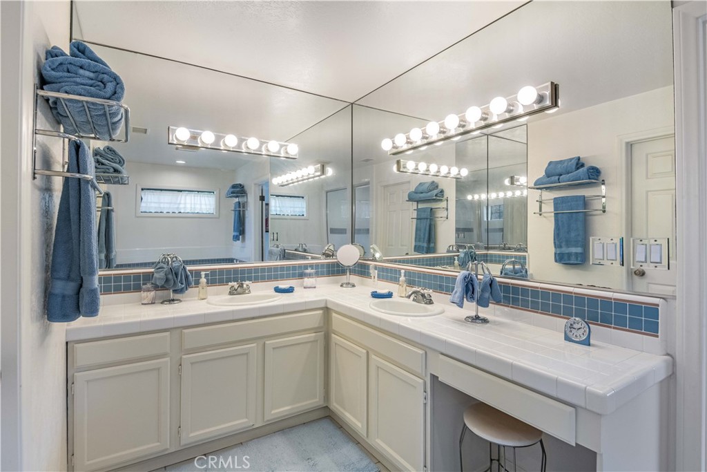 63 Ranchview Road Rolling Hills Estates, CA 90274 - Photo 18 of 28 a bathroom with a sink double vanity and a mirror