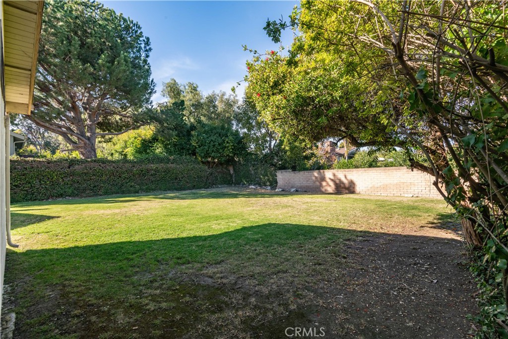 63 Ranchview Road Rolling Hills Estates, CA 90274 - Photo 24 of 28 a view of a swimming pool with an outdoor space and seating area