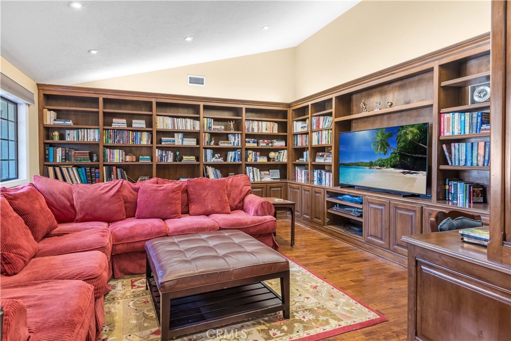 63 Ranchview Road Rolling Hills Estates, CA 90274 - Photo 9 of 28 a living room with furniture and a flat screen tv