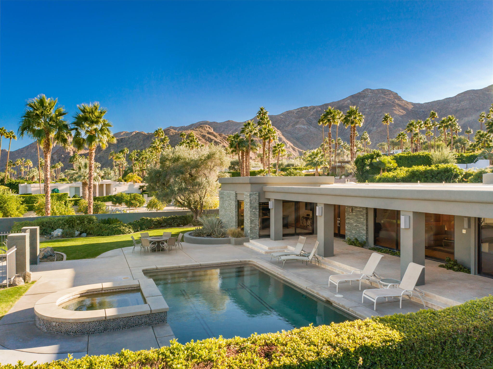 70291 Pecos Road Rancho Mirage, CA 92270 - Photo 1 of 65 a view of a swimming pool with a patio