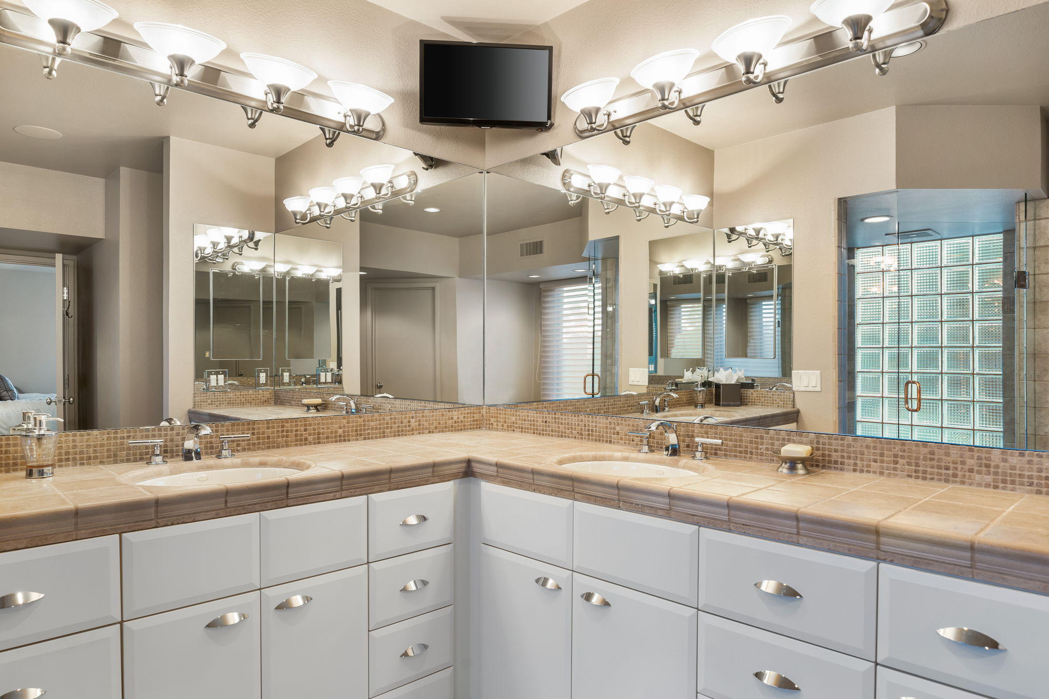 70291 Pecos Road Rancho Mirage, CA 92270 - Photo 40 of 65 a bathroom with a sink double vanity and a mirror