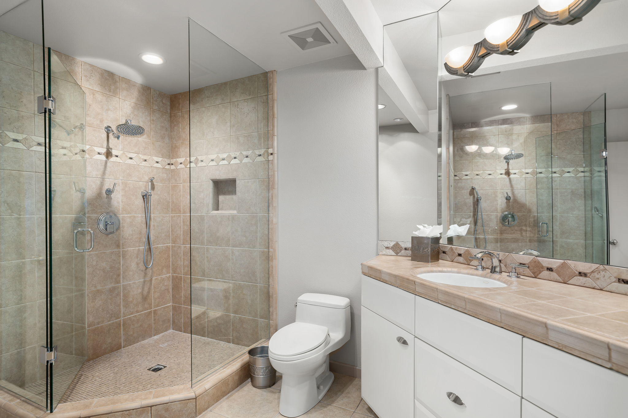70291 Pecos Road Rancho Mirage, CA 92270 - Photo 44 of 65 a bathroom with a shower sink vanity mirror and toilet