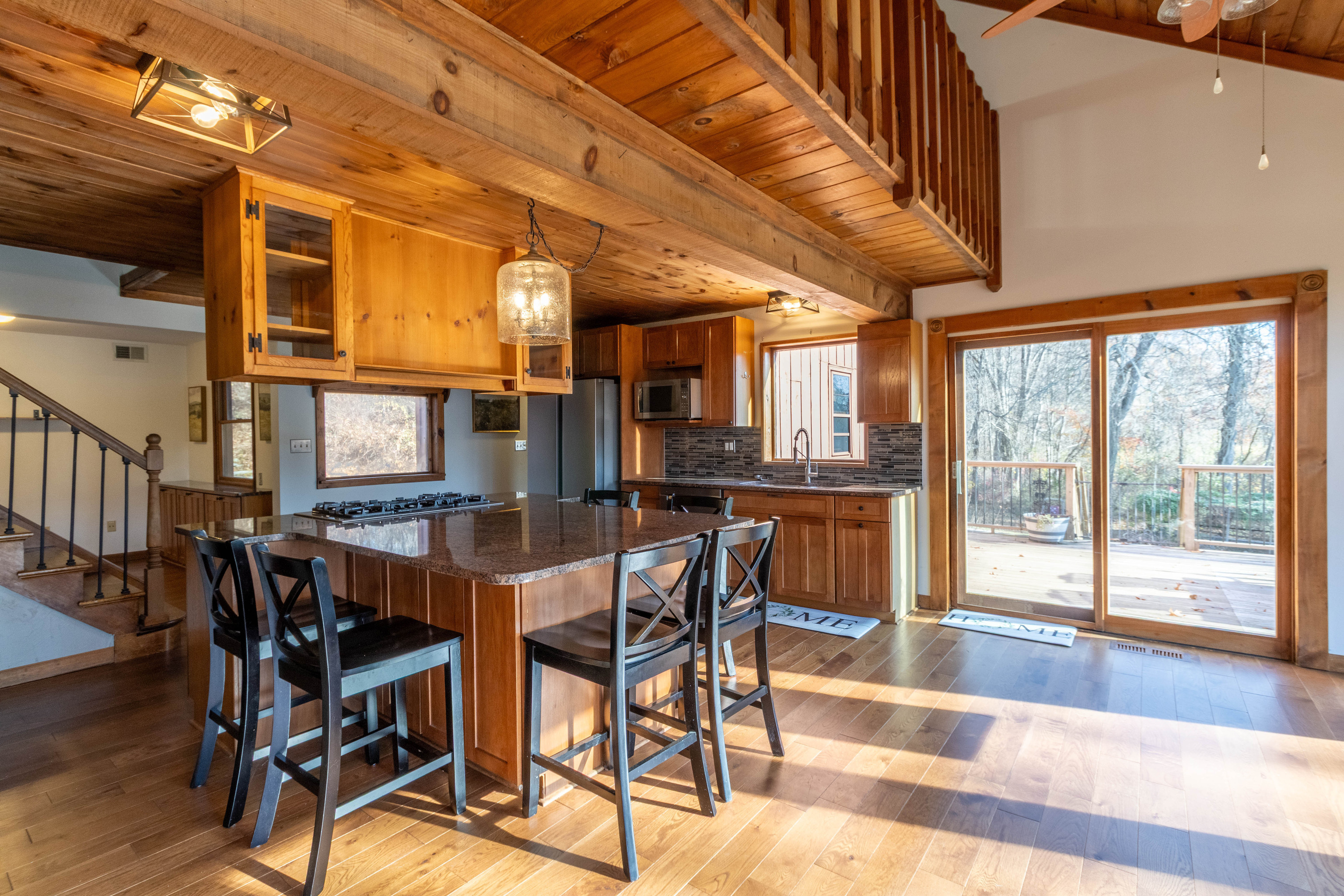 67 Moodus Leesville Road East Haddam, CT 06469 - Photo 11 of 38 a view of a dining room with furniture window and wooden floor
