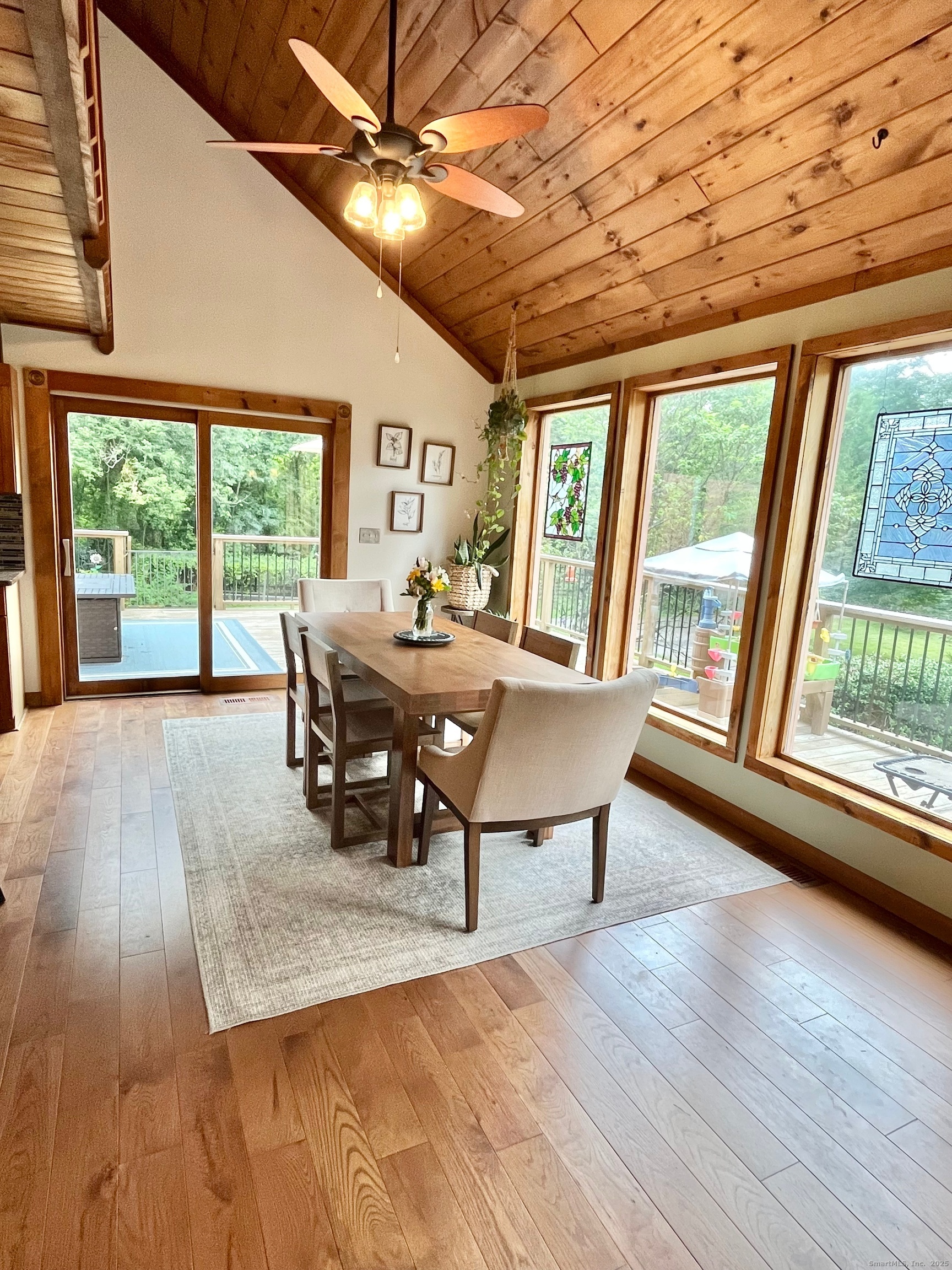 67 Moodus Leesville Road East Haddam, CT 06469 - Photo 13 of 38 a view of a dining room with furniture window and wooden floor