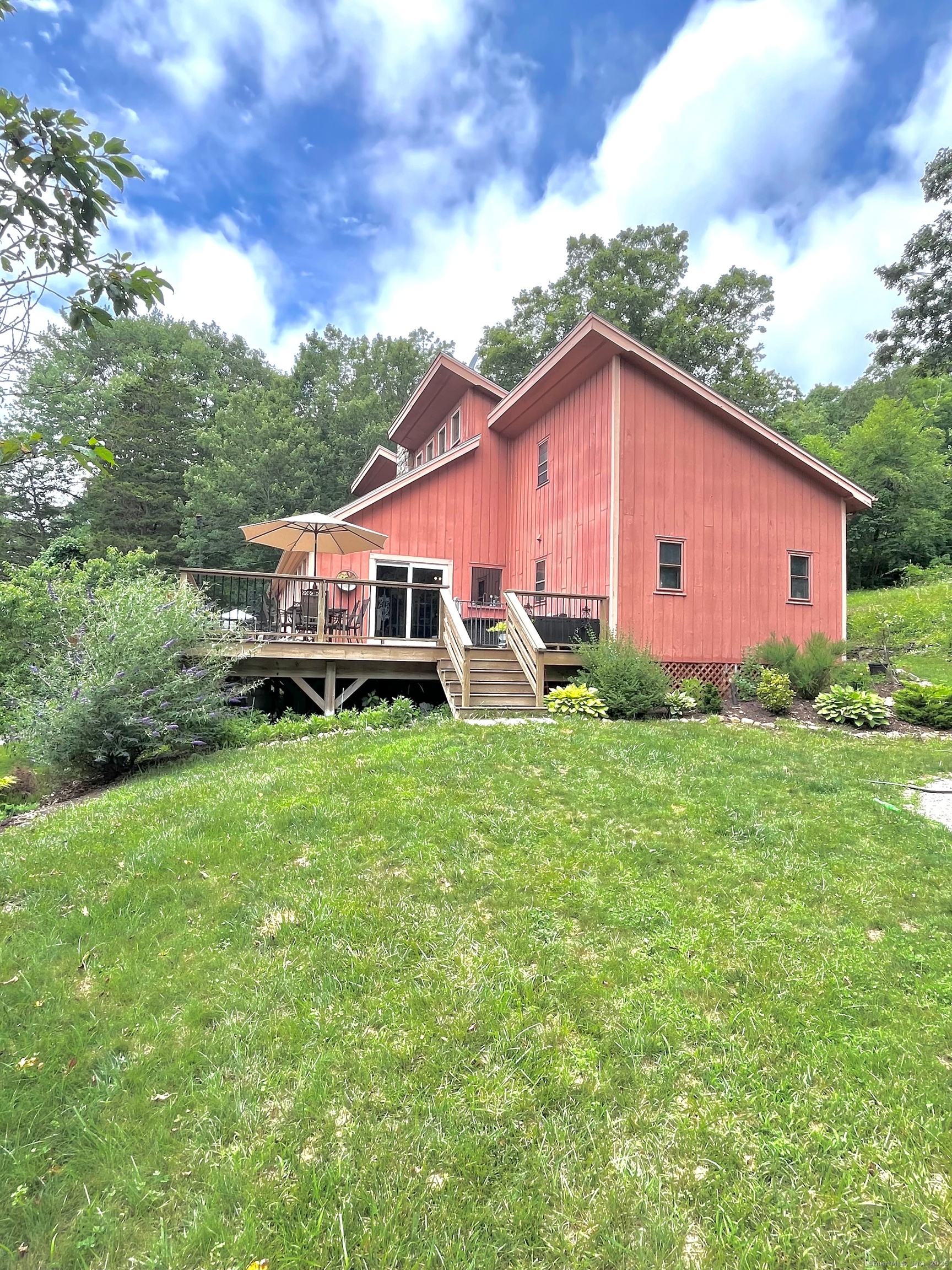 67 Moodus Leesville Road East Haddam, CT 06469 - Photo 2 of 38 a view of a house with backyard and garden