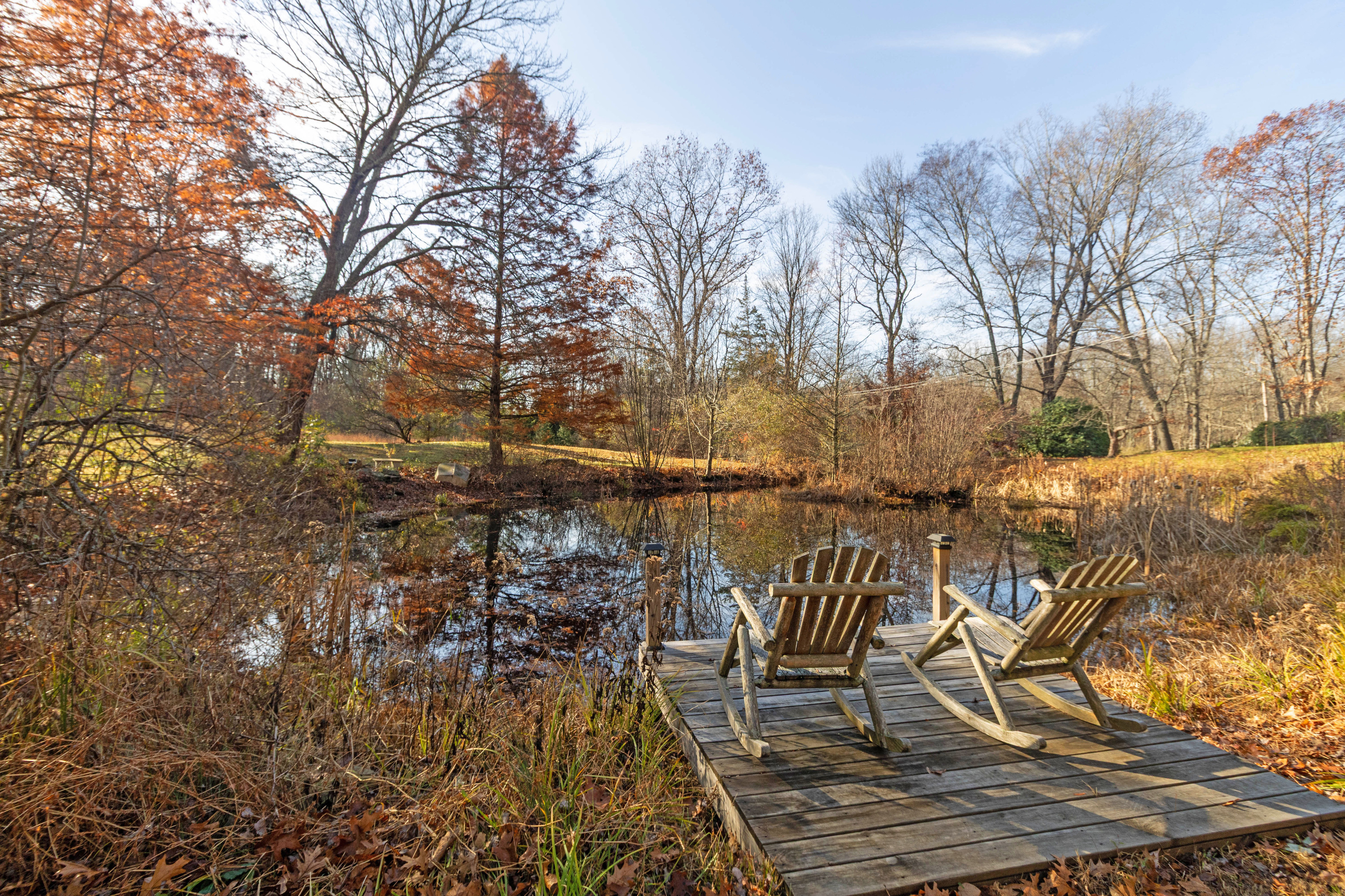 67 Moodus Leesville Road East Haddam, CT 06469 - Photo 38 of 38 a view of a lake with table and chairs