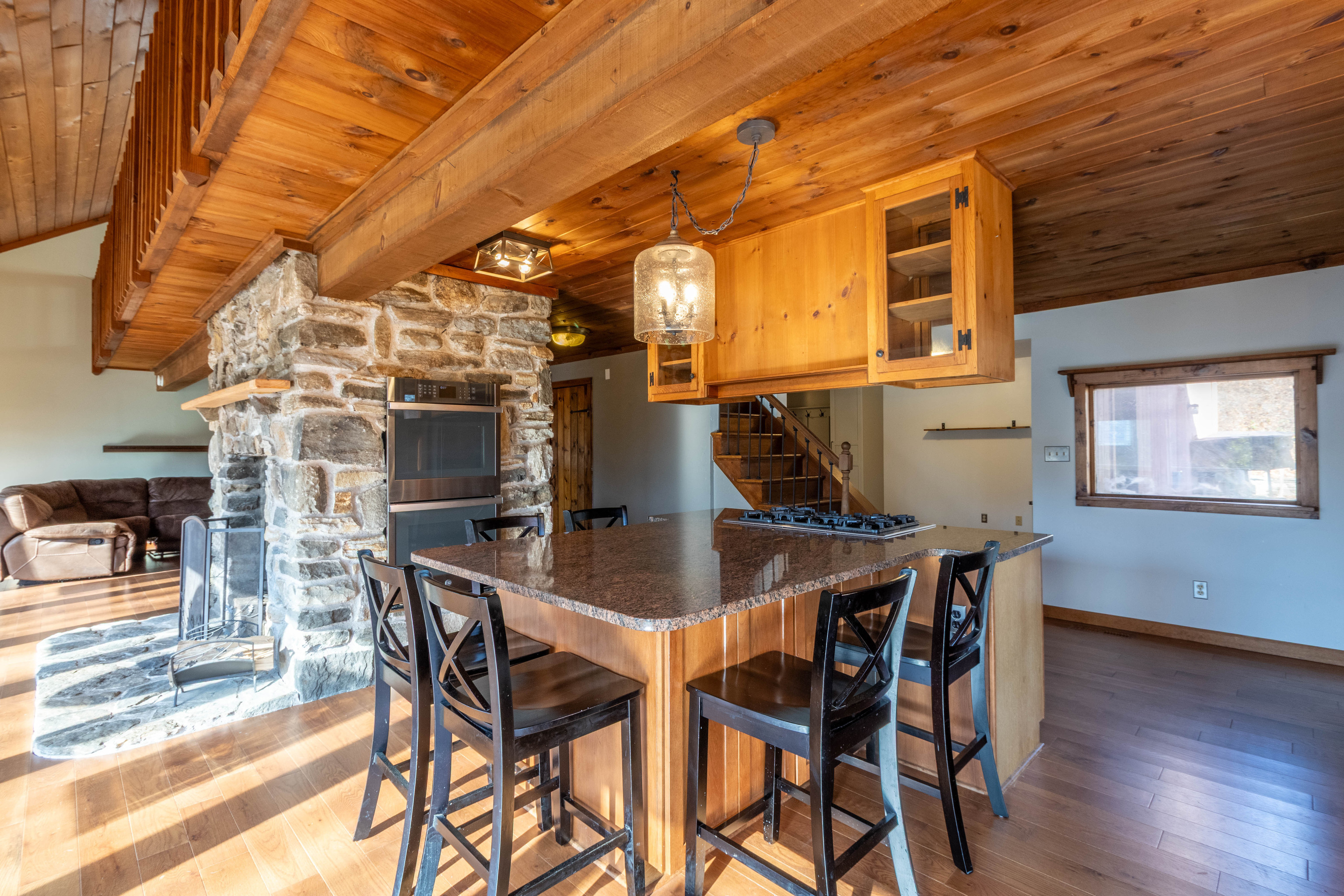 67 Moodus Leesville Road East Haddam, CT 06469 - Photo 4 of 38 a view of a dining room with furniture and wooden floor