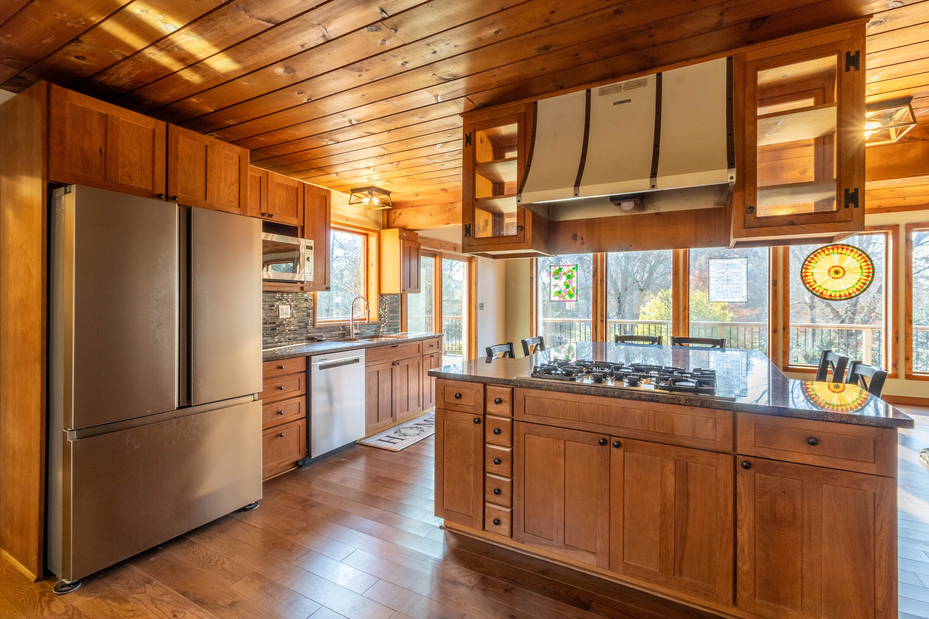 67 Moodus Leesville Road East Haddam, CT 06469 - Photo 10 of 38 a kitchen with stainless steel appliances granite countertop a refrigerator and a stove