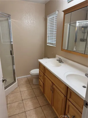 a view of a backyard with sitting area