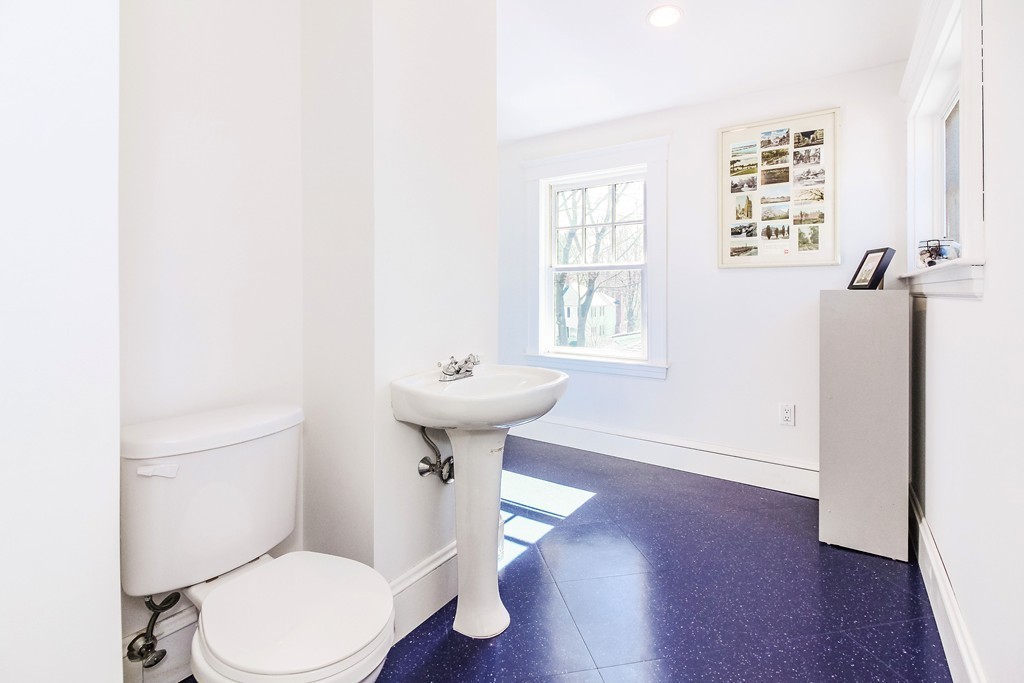 20 Stoneleigh Road, Unit 20 Newton, MA 02465 - Photo 23 of 30 a bathroom with a sink a toilet and shower