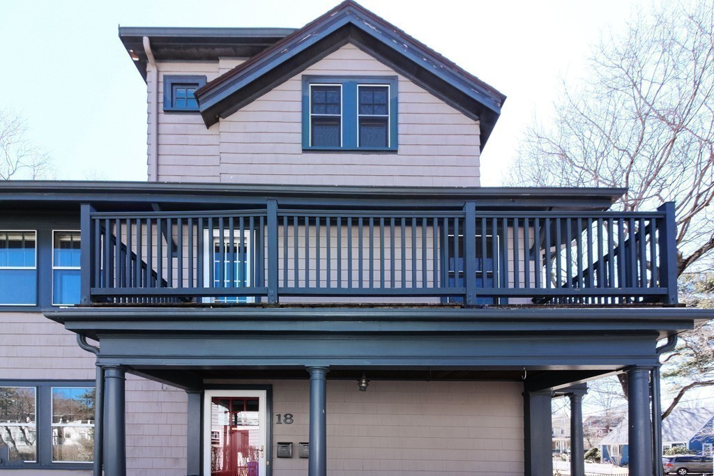 20 Stoneleigh Road, Unit 20 Newton, MA 02465 - Photo 26 of 30 a view of a house with a deck and furniture