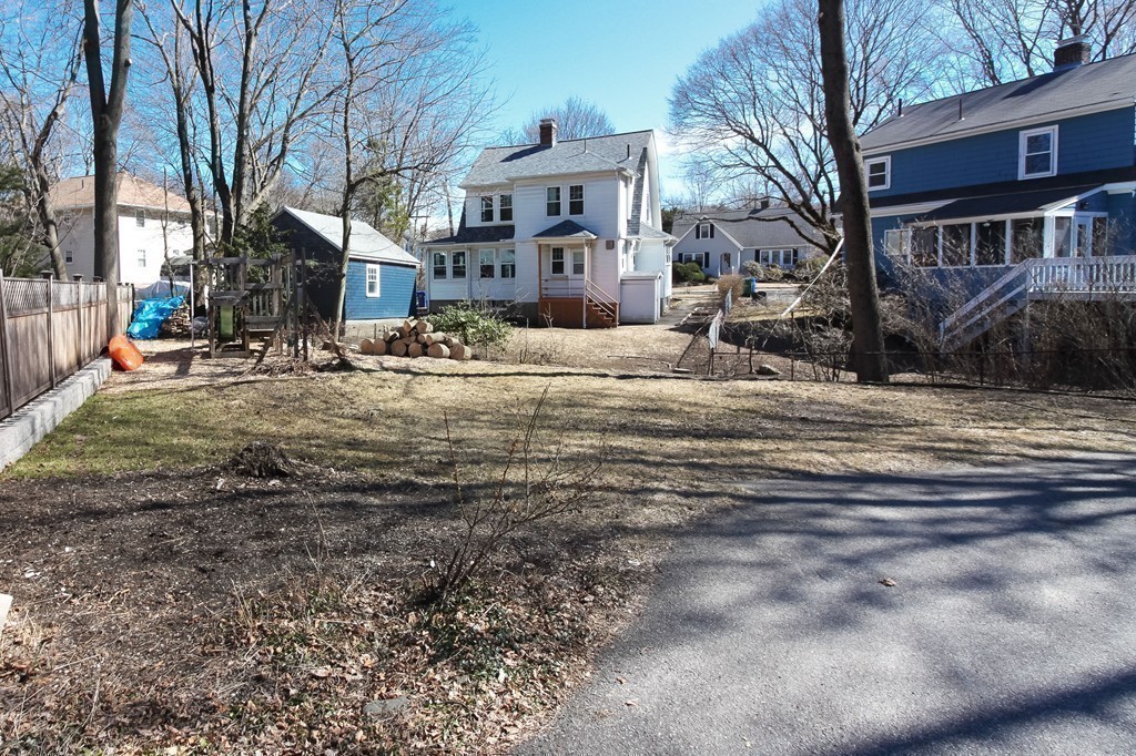 20 Stoneleigh Road, Unit 20 Newton, MA 02465 - Photo 28 of 30 a view of city street with a house