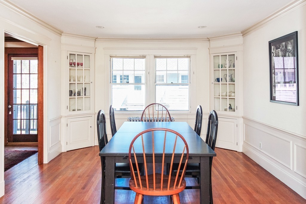 20 Stoneleigh Road, Unit 20 Newton, MA 02465 - Photo 4 of 30 a view of a a dining room with furniture window and wooden floor